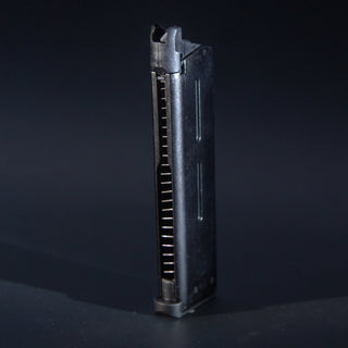 Front view of Tokyo Marui M45A1 green gas airsoft magazine
