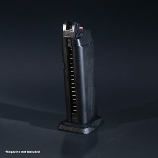 Front view of EMG SAI BLU and AW Custom UT green gas airsoft magazine